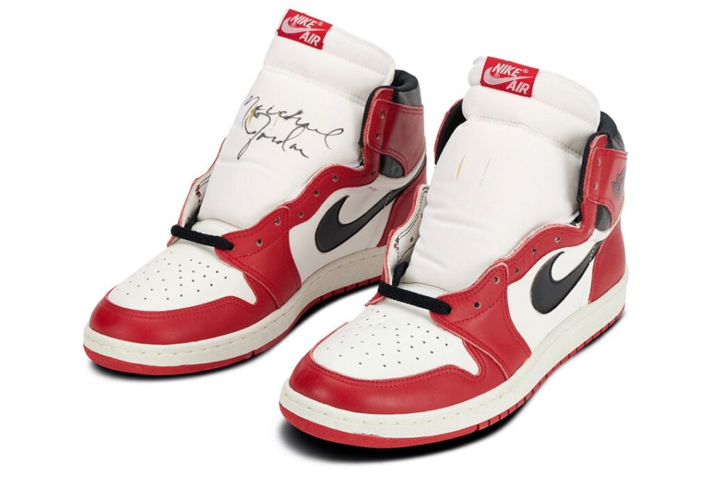 Signed Air Jordan 1 “Chicago” player sample with Michael Jordan’s signature on the tongue, preserved in pristine condition.
