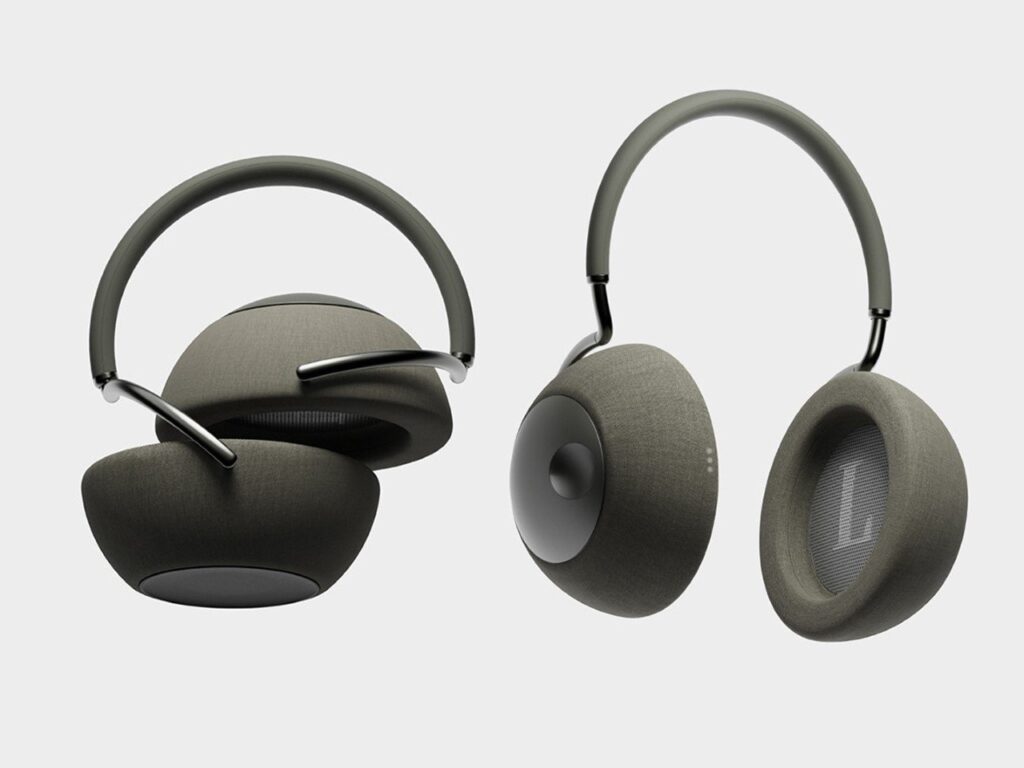 Satellite orb-shaped speaker split into two halves, showcasing its transformation into a pair of ergonomic headphones.