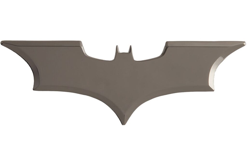“Stylish Kith x Batman Batarang Letter Opener in matte black, showcasing sleek design and subtle branding details.”