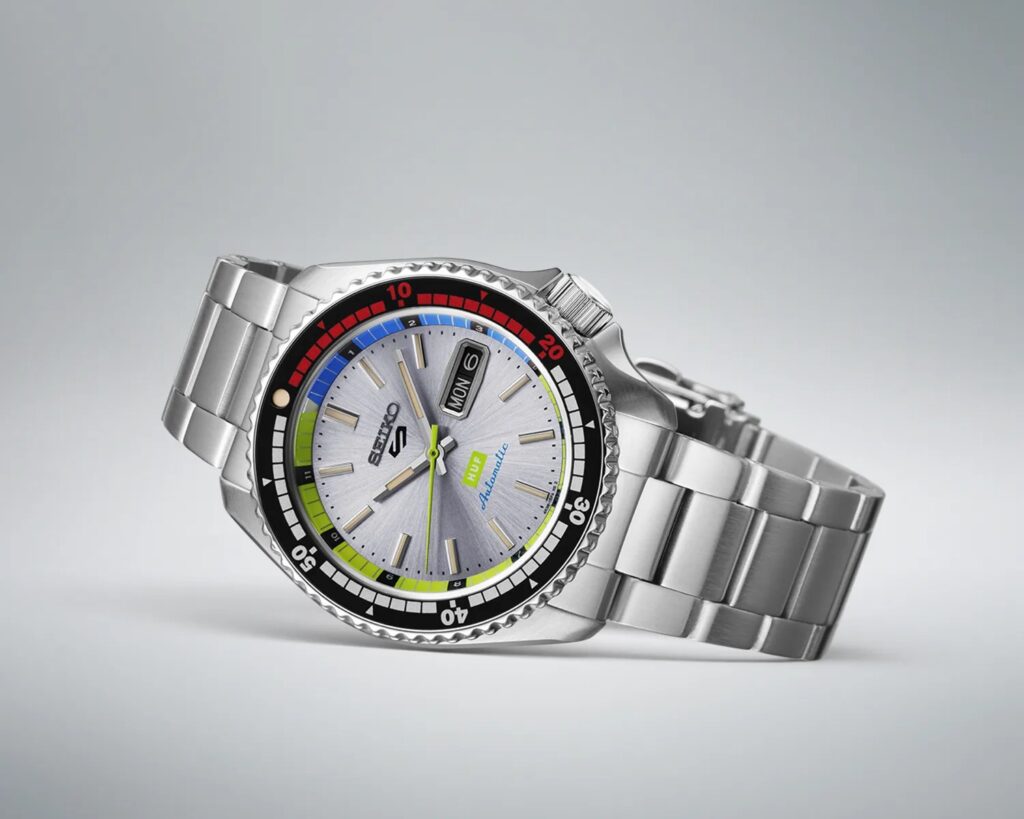 Alt Text: A close-up of the Seiko 5 Sports x HUF collaboration watch, featuring a bold dial with skateboarding-inspired graphics, luminous markers, a stainless steel case, and a green and white NATO strap, showcasing the perfect blend of streetwear aesthetics and traditional watchmaking craftsmanship.
