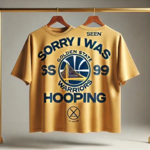 An oversized WARRIORS x SEEN “Sorry I Was Hooping” T-shirt with the Warriors logo on the front and bold text on the back.