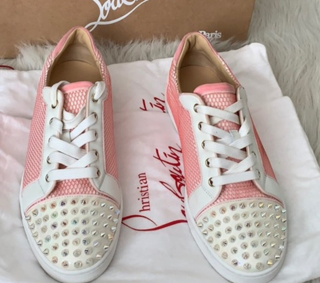 Christian Louboutin Gondolita Velvet Trainers featuring a luxurious velvet upper, red sole, and signature spike embellishments.