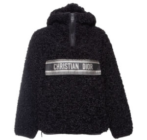 A Christian Dior faux fur jacket displayed highlighting its plush texture and luxurious design.