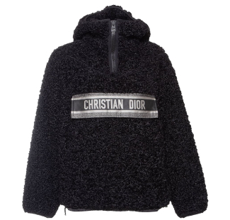 A Christian Dior faux fur jacket displayed highlighting its plush texture and luxurious design.