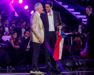 Matteo Bocelli performing on stage, honoring his father Andrea Bocelli’s legacy in a heartfelt musical performance.