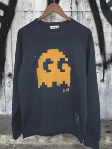 “Sun City Rags Ghosted long-sleeve sweatshirt with distressed details, ghostly graphics, and vintage-inspired design.”