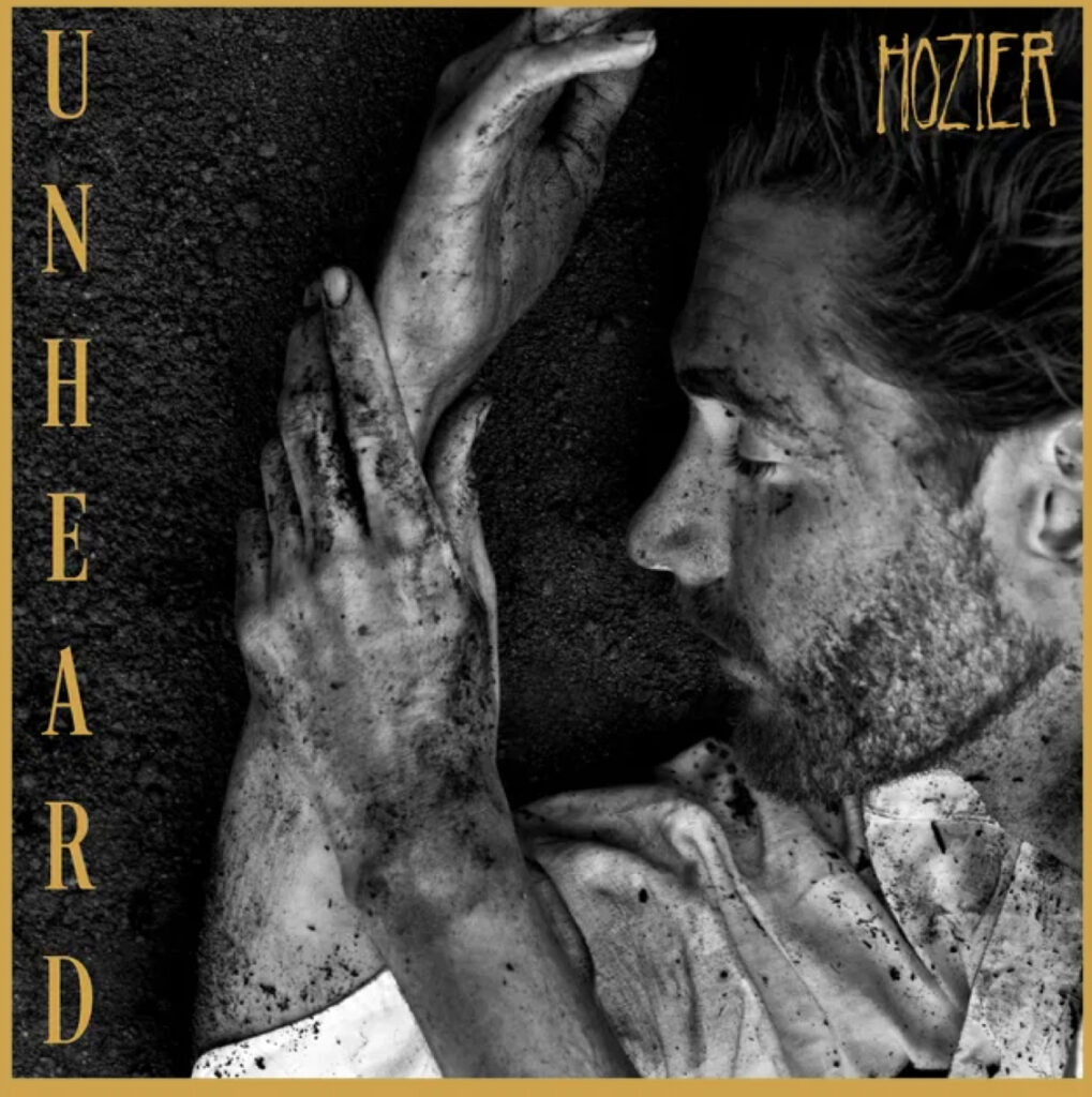 Album cover art for Hozier’s Unheard EP, featuring a minimalist design with soft, muted tones and abstract imagery evoking introspection and emotional depth.