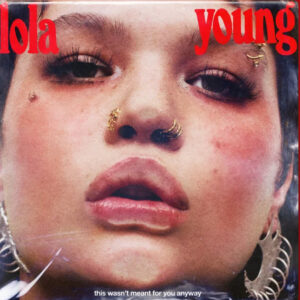 Cover art for Lola Young’s single ‘Messy,’ featuring bold typography and a moody portrait of the singer in monochrome tones