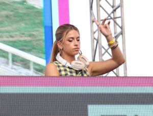 “Xandra Pohl at the 2024 Pegasus World Cup, showcasing her dynamic style and presence as a DJ and fashion icon.”