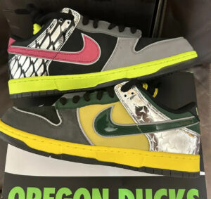 Close-up of the Generation ‘O’ Pack Home Nike Dunk showcasing its patchwork design inspired by Oregon Ducks’ history