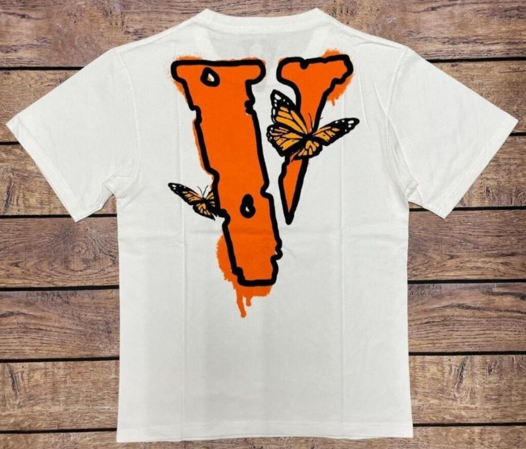 Juice Wrld x Vlone Butterfly Tee featuring “Legends Never Die” text and monarch butterfly details on a bold Vlone “V” logo