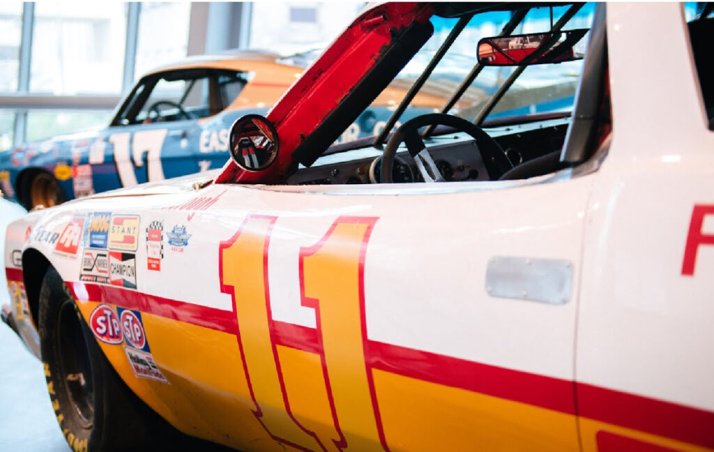 The Oldsmobile Cutlass 442 displayed on NASCAR Hall of Fame’s Glory Road, celebrating its championship legacy