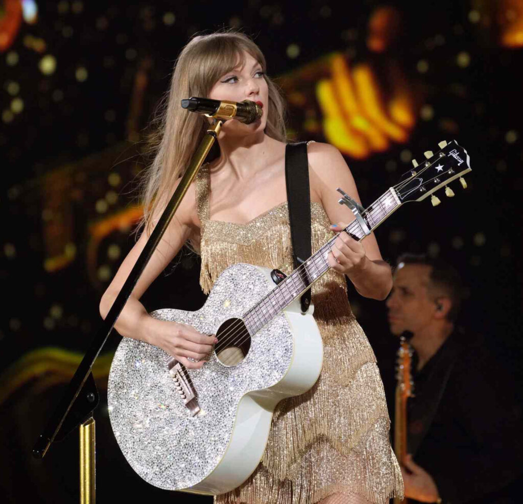 Taylor Swift waves goodbye during the final show of her Eras Tour, marking the end of a monumental chapter in her career