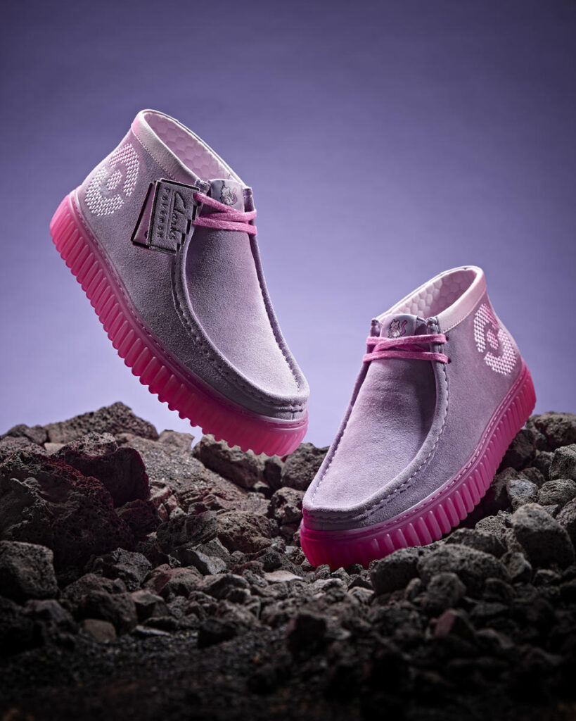 Mewtwo-inspired shoe from the 2024 Clarks x Pokémon Endgame Collection featuring grey suede, pink accents, and Pokédex details