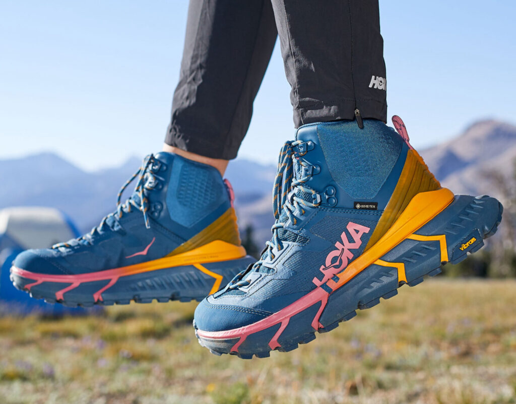Hoka hiking boot with improved cushioning, Vibram Megagrip outsole, and Gore-Tex waterproofing, designed for rugged trails