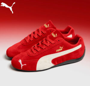 Close-up of Puma Speed Cat sneakers showcasing their sleek design, suede upper, and low-profile sole, inspired by motorsports