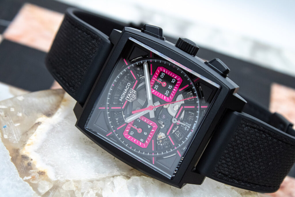 TAG Heuer Monaco Chronograph Skeletonized Pink watch featuring a skeletonized dial, pink accents, and alligator strap