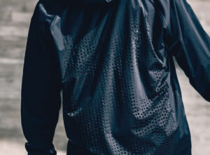 Haven’s technical apparel showcasing a waterproof GORE-TEX jacket, perfect for urban and outdoor adventures, rain or shine