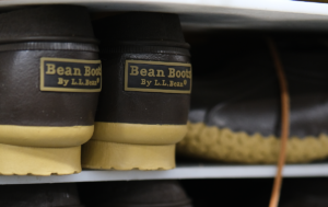 Close-up of L.L.Bean Bean Boots showcasing waterproof rubber soles and leather uppers, crafted for durability and style