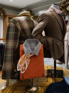 Anderson & Sheppard’s New York store at Bergdorf Goodman, showcasing bespoke suits, knitwear, and Savile Row craftsmanship