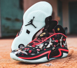 Rui Hachimura x Air Jordan 1 Low OG “Cranes” sneaker featuring a white and cream colorway with embroidered crane details