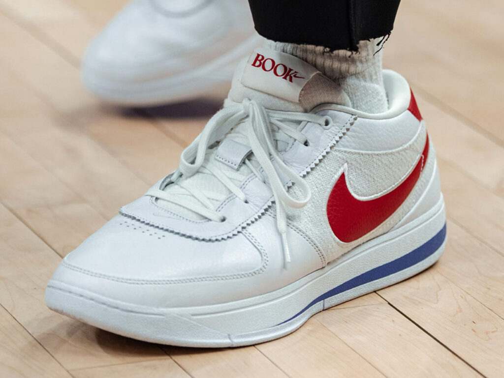 The Nike Book 1 “Forrest Gump” sneaker in white, red, and blue, showcasing heritage-inspired design with modern upgrades