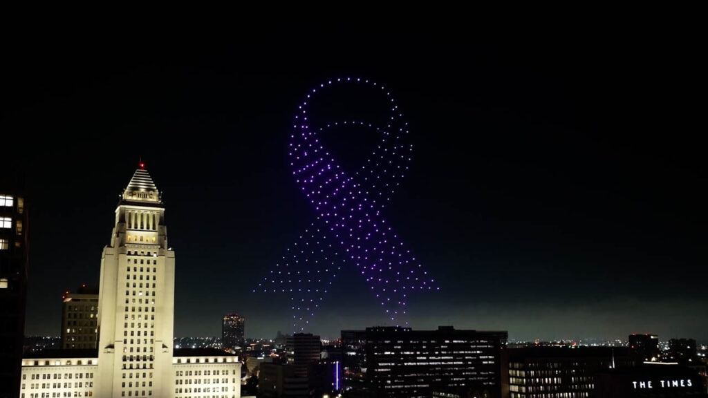 A breathtaking drone light show by Grizzly Entertainment, showcasing intricate patterns and vibrant colors in the night sky