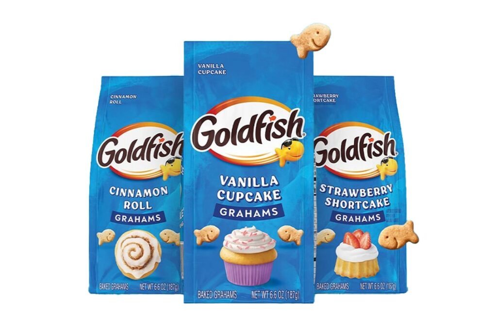 Goldfish new graham cracker flavors, including Cinnamon Roll, Vanilla Cupcake, and Strawberry Shortcake, in colorful packaging