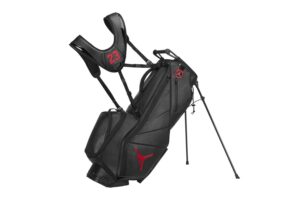 Jordan Brand Fadeaway Premium Golf Bag in black and red, featuring the iconic Jumpman logo and multiple storage compartments