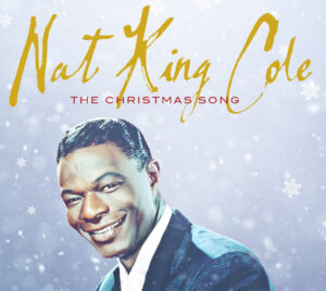 Nat King Cole performing “The Christmas Song” with his iconic smile, symbolizing the timeless appeal of his music