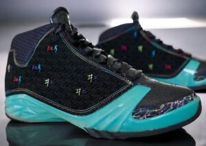 A rare Slam Dunk x Air Jordan XX3 “Takehiko Inoue” sneaker with Kanji embroidery, glossy teal midsole, and manga-inspired graphics
