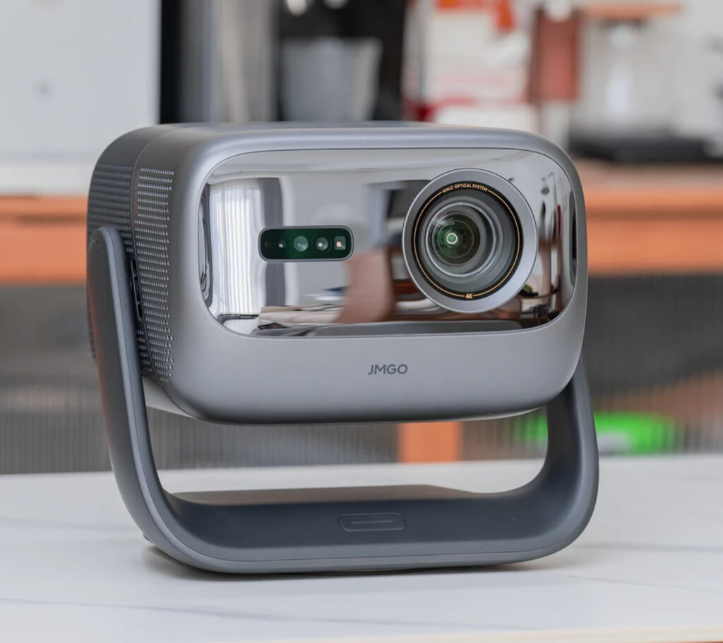 The JMGO N3 Ultra Max projector showcasing its motorized gimbal and motion-sensing remote for effortless adjustments