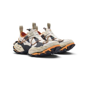 A bold Balenciaga rugged sneaker featuring durable materials, chunky soles, and outdoor-inspired design elements