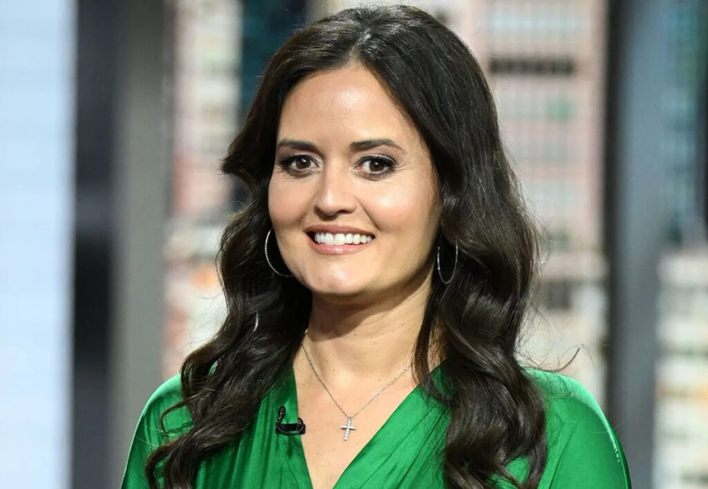 Danica McKellar smiles in a makeup-free selfie celebrating her 50th birthday, looking radiant and natural in soft lighting