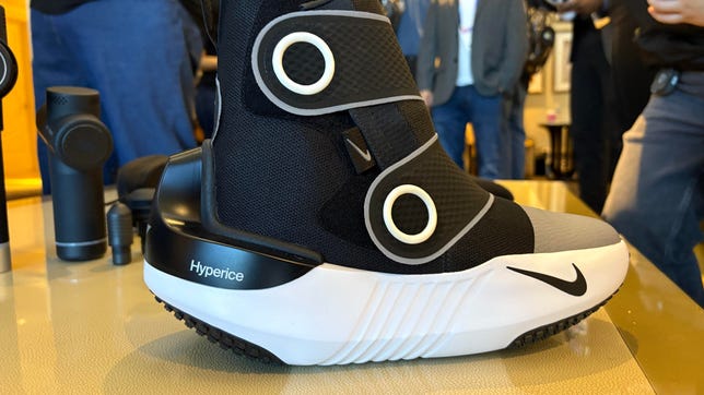 Nike x Hyperice recovery shoes with a sleek, futuristic design featuring heating, massage, and cooling technology for recovery