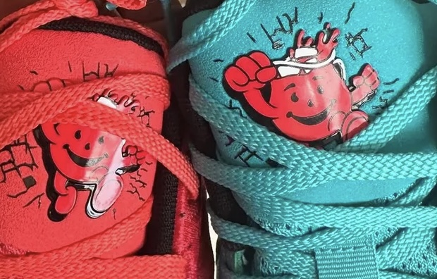 Image of Nike Ja 2 “Kool-Aid” sneakers featuring vibrant red and pink accents with playful, bold color details