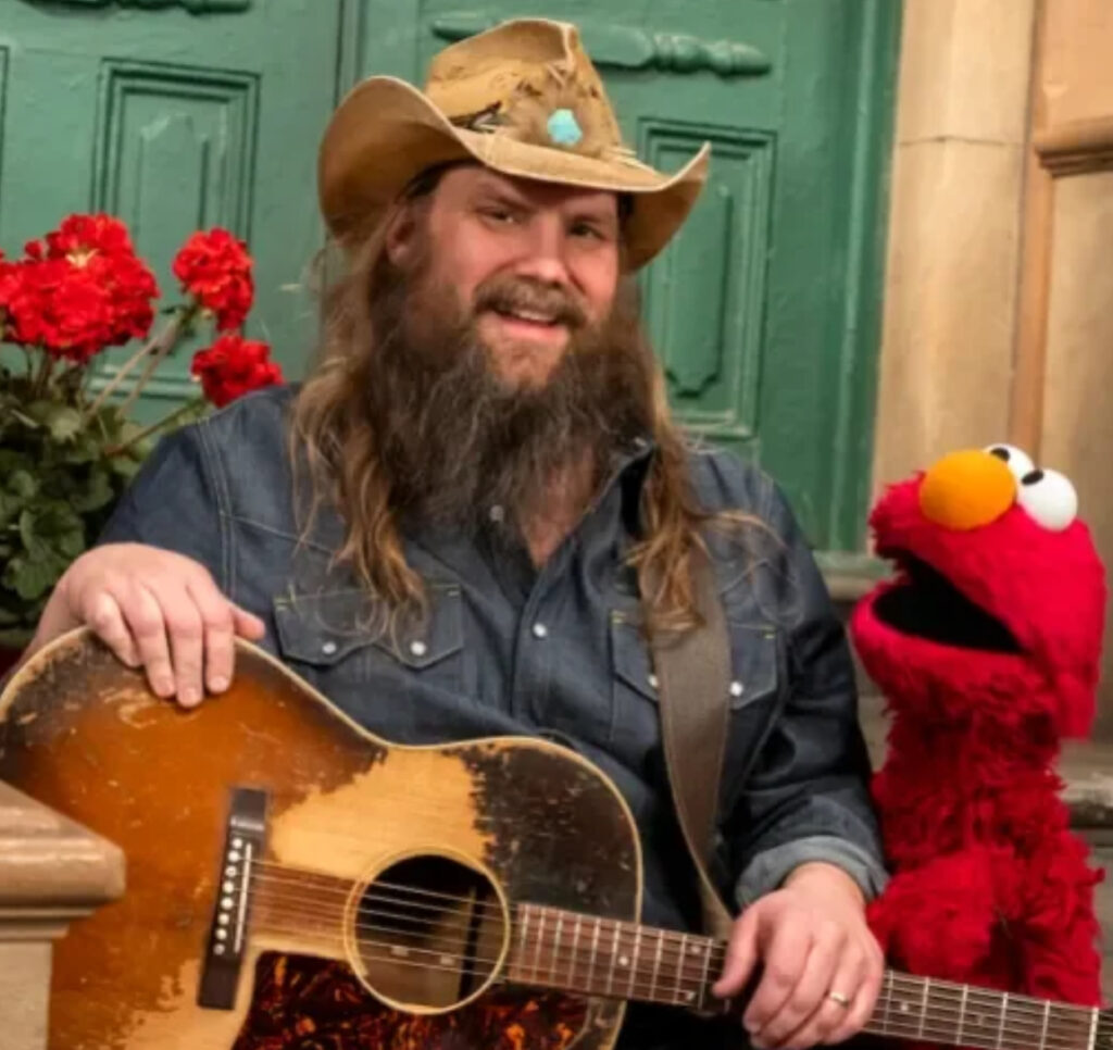 Chris Stapleton performing alongside Sesame Street characters, teaching children about music, friendship, and cooperation