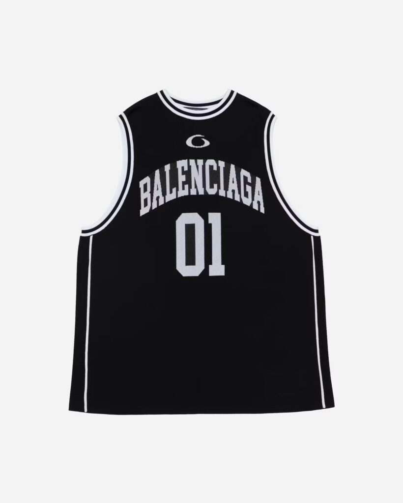 A sleek matte black basketball embossed with the Balenciaga logo, blending high fashion and athletic culture