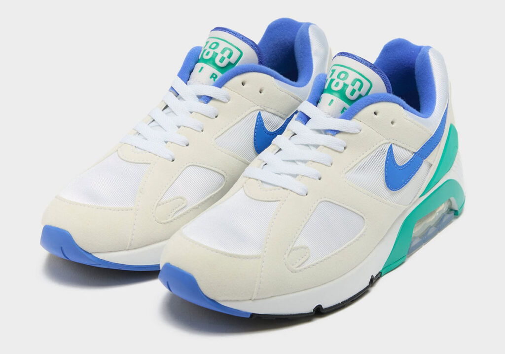 “Nike Air Max 180 ‘Bluebird’ sneaker with vibrant blue accents, showcasing its iconic retro design on a white background