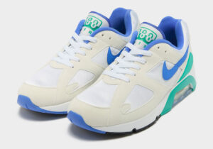 “Nike Air Max 180 ‘Bluebird’ sneaker with vibrant blue accents, showcasing its iconic retro design on a white background