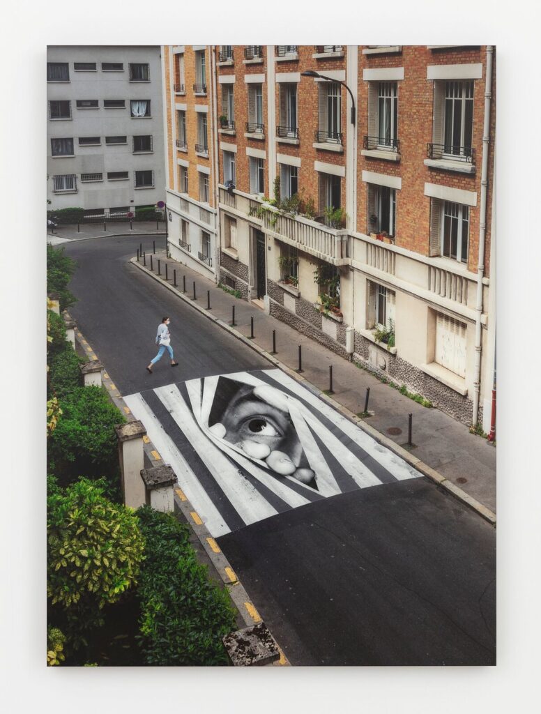 JR’s Finding Hope, Day View, Paris, France, 2020 – a large-format color photograph with plexiglass, wood, and aluminum