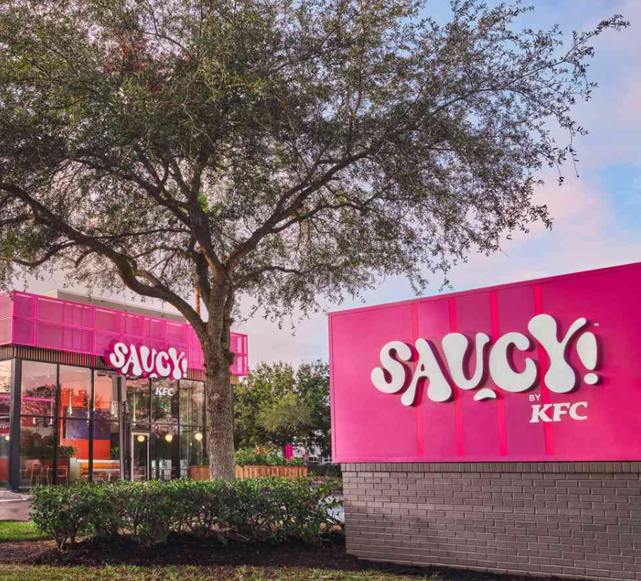 KFC’s Saucy spin-off restaurant showcasing crispy chicken tenders with vibrant sauces and a colorful, modern dining setup