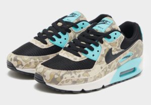 Nike Air Max 90 Camo Aurora Green sneakers featuring a vibrant green Swoosh, camo overlays, and white midsole
