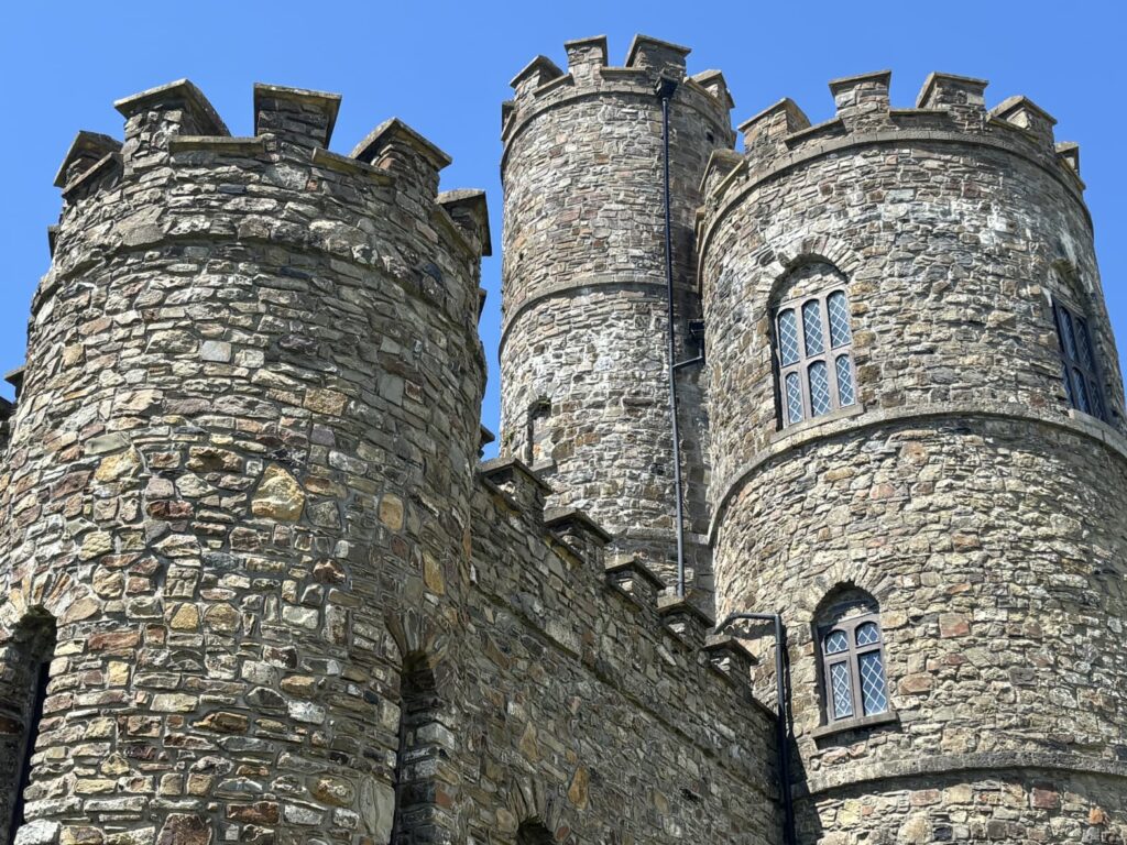 300-year-old Grade II-listed Devon castle with a fortified tower, walled courtyard, and panoramic countryside views