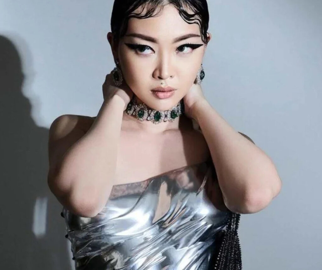 Grace Ling in one of her sculptural avant-garde designs, showcasing her bold yet wearable fashion aesthetic in New York