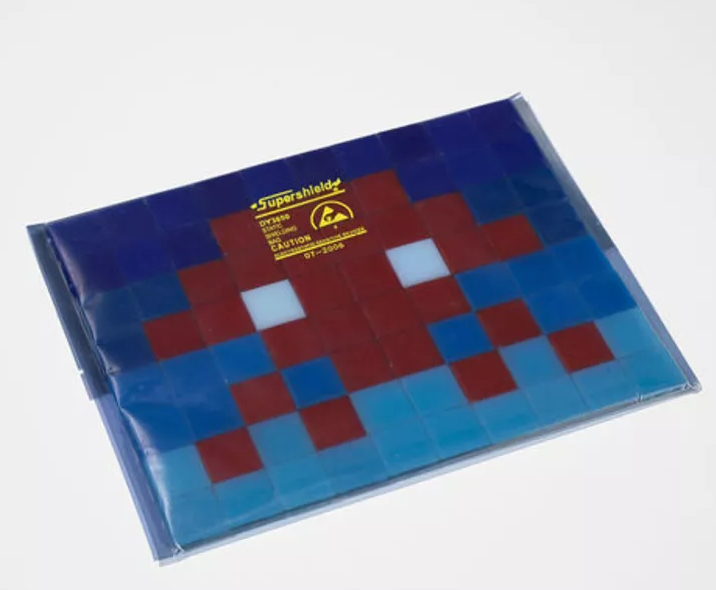 Limited-edition Invasion Kit #05 Atari 2600 by Invader, featuring retro gaming design and pixel art-inspired cartridge