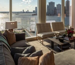 Zendaya’s dining room featuring rattan chairs and natural tones, blending retro charm with contemporary elegance