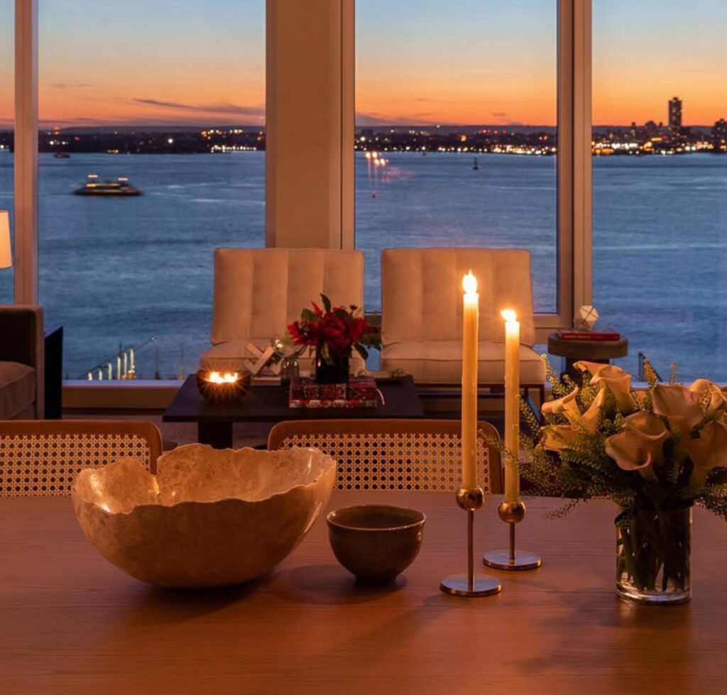 Zendaya’s dining room featuring rattan chairs and natural tones, blending retro charm with contemporary elegance