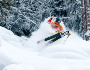 Eric Hjorleifson skiing effortlessly through deep powder, showcasing the performance of the HOJI skis by 4FRNT Skis