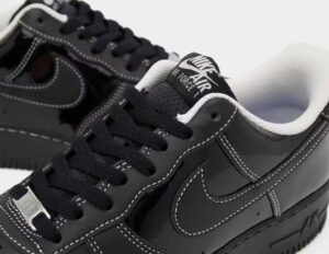 All-black Nike Air Force 1 ‘Paris’ featuring sleek monochrome leather design with subtle Paris-inspired details